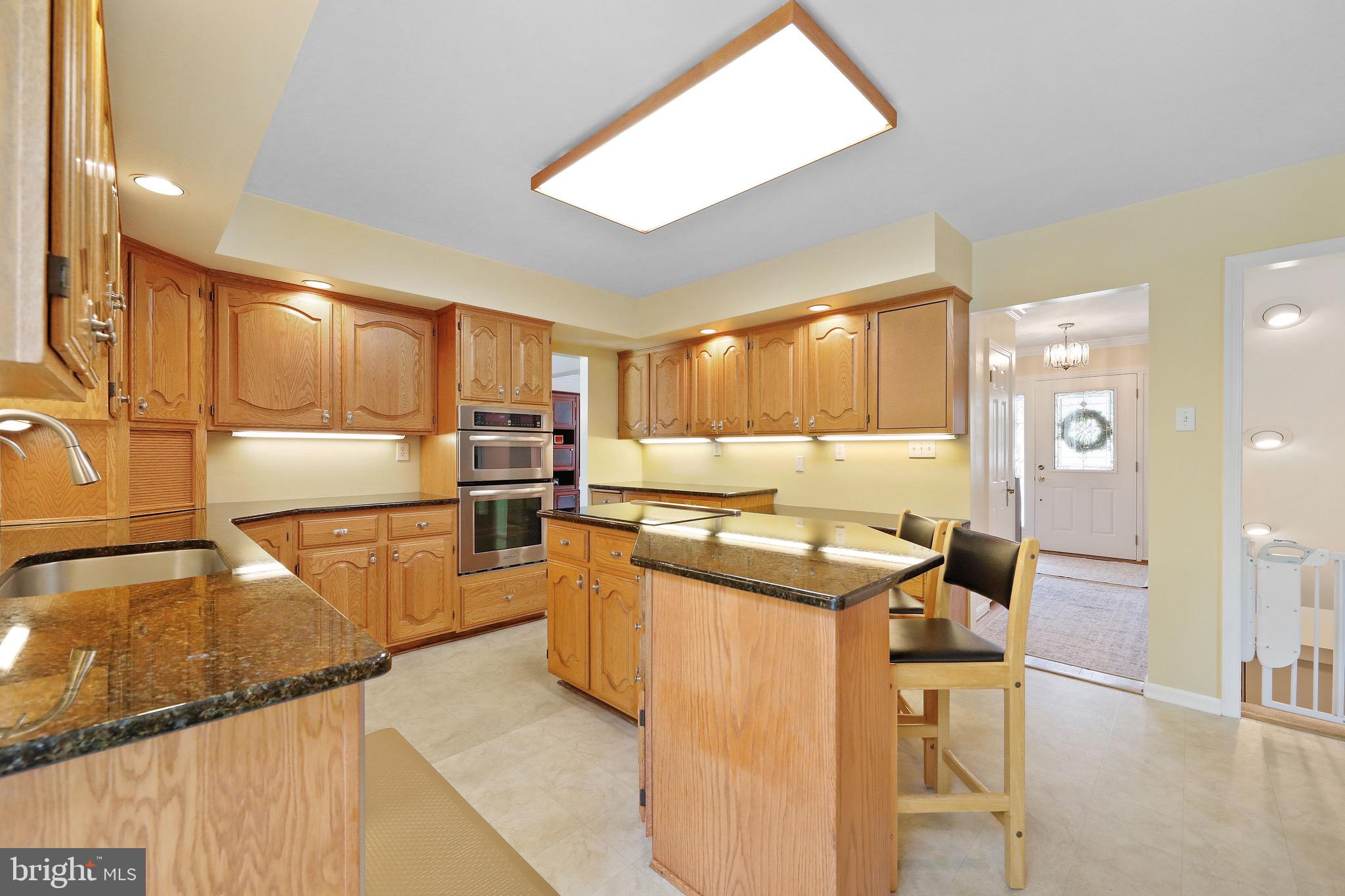 716 Liberty Road Mount Laurel, NJ 08054 - Photo 7 of 51 a kitchen with stainless steel appliances granite countertop a sink stove and cabinets