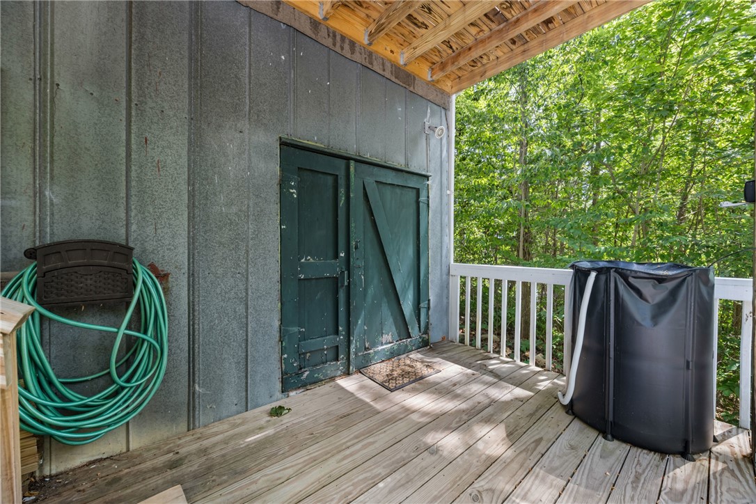 1695 Long Point Beach Road Torrey, NY 14527 - Photo 12 of 48 Basement walkout. Great storage!