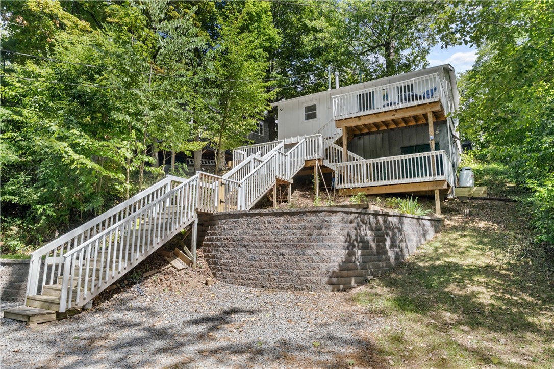 1695 Long Point Beach Road Torrey, NY 14527 - Photo 3 of 48 New stairs to entry