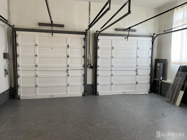 a view of walk in closet with clothes