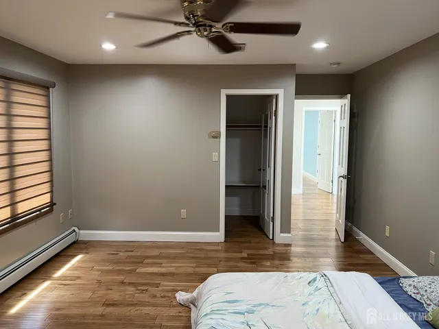 a view of livingroom with hardwood floor and staircase