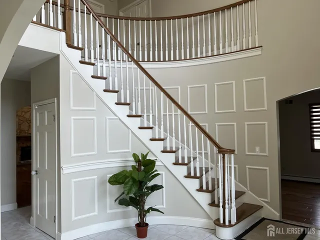 a view of entryway with wooden floor
