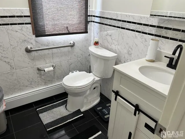 a bathroom with a sink and a toilet