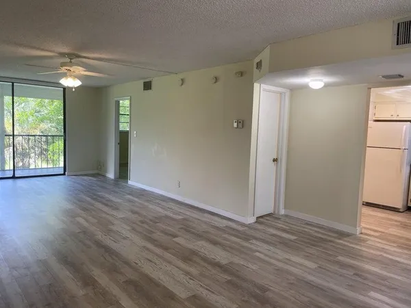 a view of livingroom with hardwood floor and window
