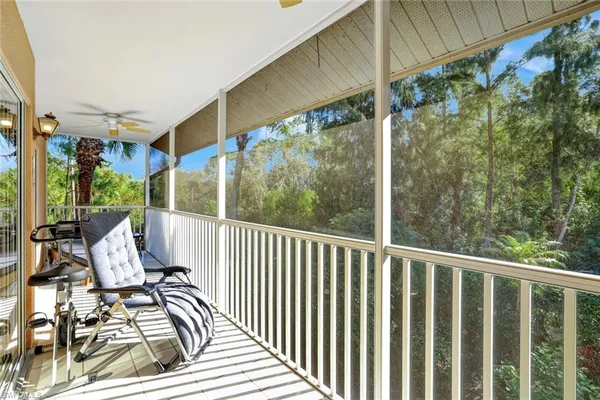 a view of balcony with furniture