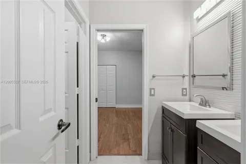 a bathroom with a shower a toilet and a shower