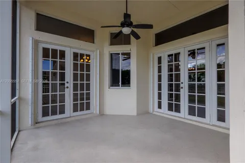 a view of a room with a large window