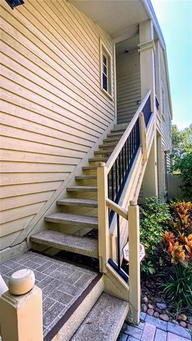 a view of stairs and with a yard