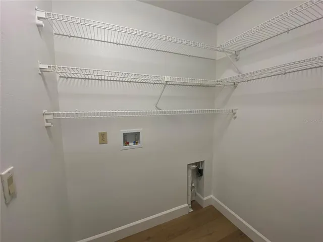 a view of a room with racks on the wall