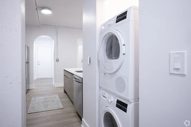 a view of entryway with washer and dryer