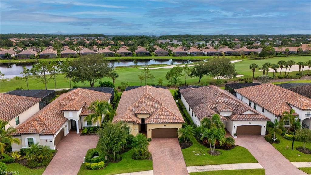 12740 Kinross Lane Naples, FL 34120 - Photo 24 of 32 an aerial view of a house with a garden