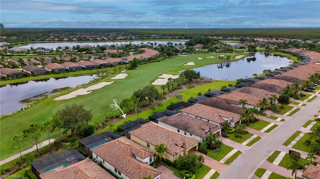 12740 Kinross Lane Naples, FL 34120 - Photo 25 of 32 an aerial view of a city