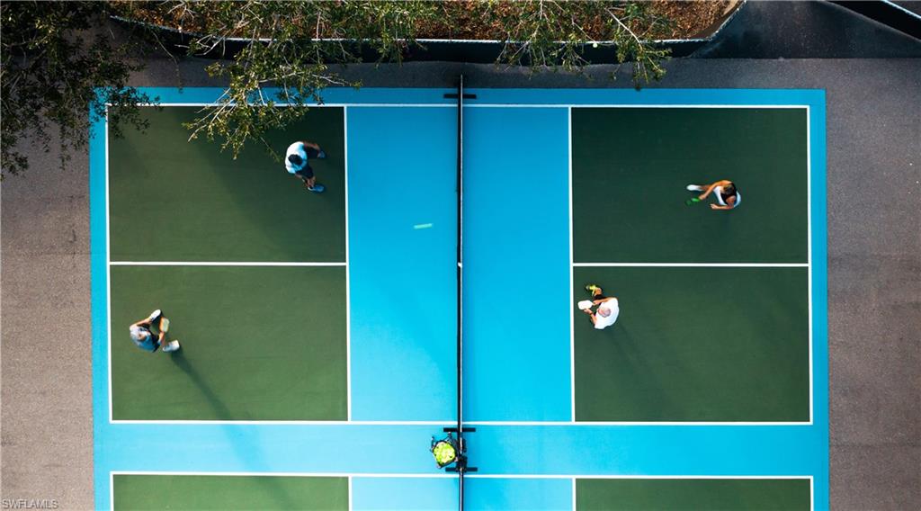 12740 Kinross Lane Naples, FL 34120 - Photo 31 of 32 a view of a wooden door