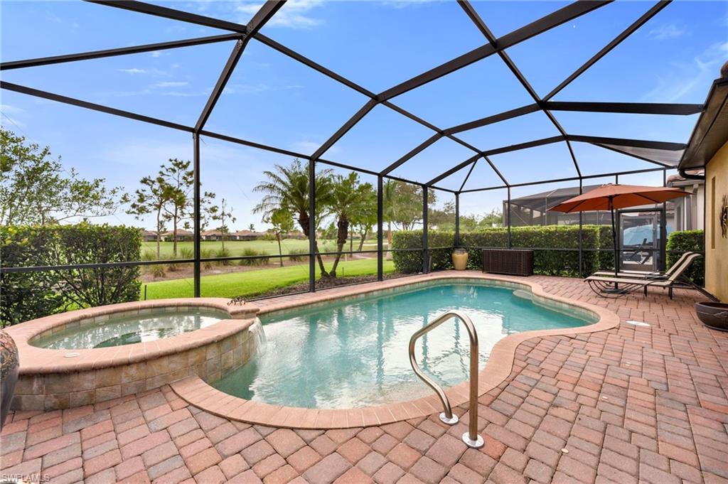 12740 Kinross Lane Naples, FL 34120 - Photo 6 of 32 a view of swimming pool with seating space