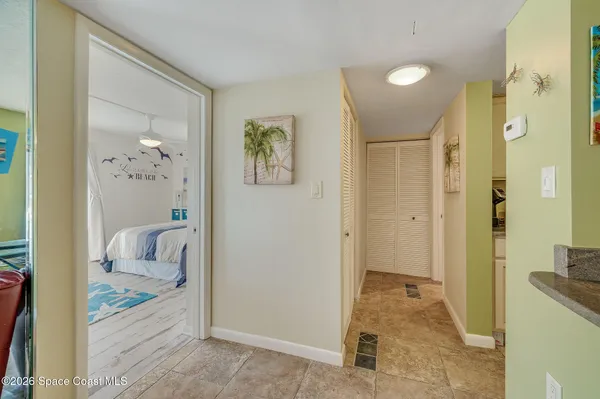 a view of a bathroom with tub and shower
