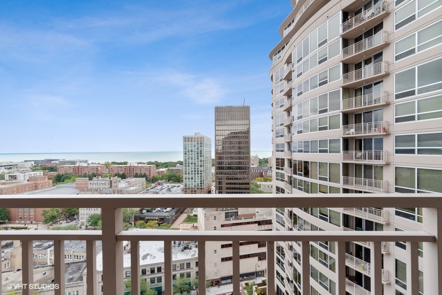 807 Davis Street, Unit 1710 Evanston, IL 60201 - Photo 10 of 21 a view of a building from a balcony