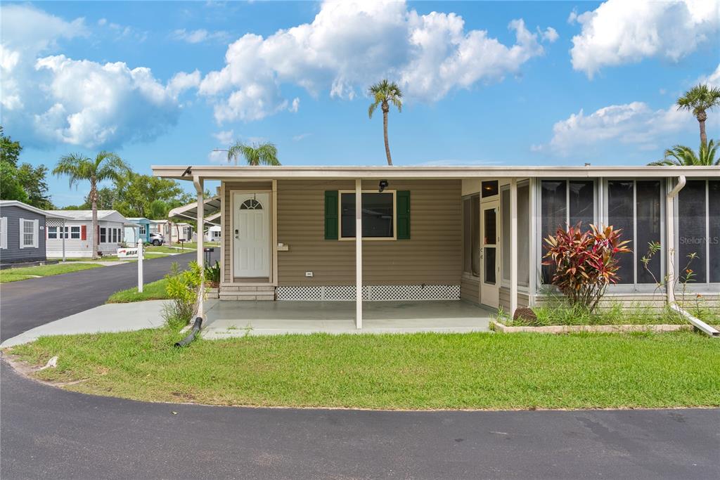 4434 Tucker Square New Port Richey, FL 34652 - Photo 31 of 37 a house view with a garden space