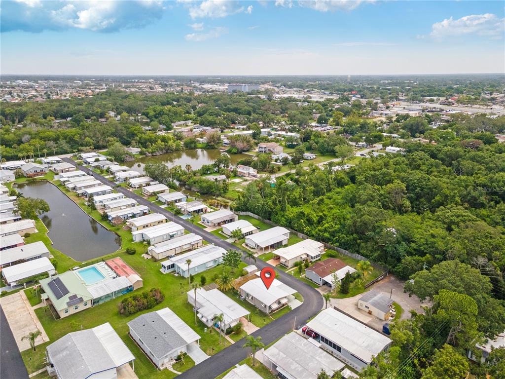 4434 Tucker Square New Port Richey, FL 34652 - Photo 37 of 37 an aerial view of residential houses with outdoor space