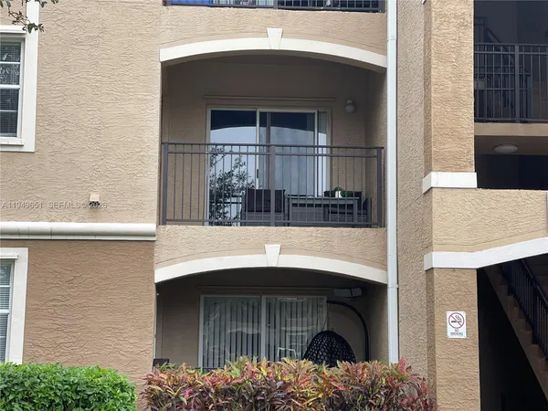a front view of a house with garage