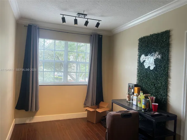a room with furniture and a window