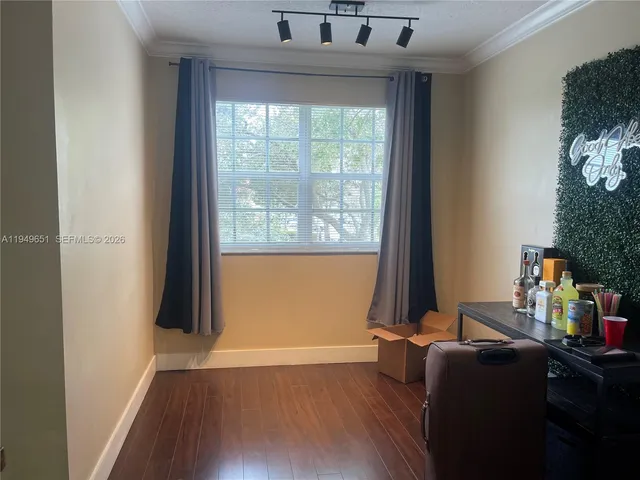 a room with furniture and a window
