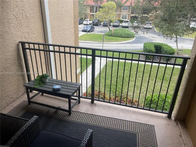 a view of chair and glass door