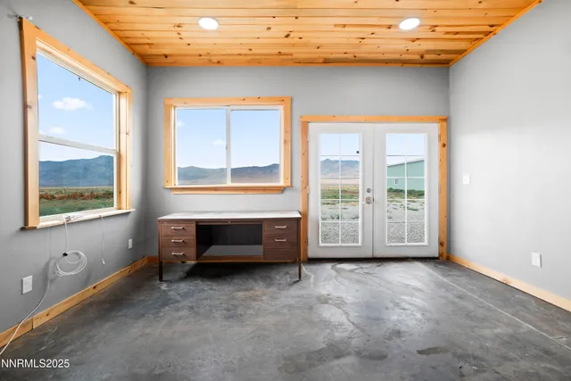 a view of livingroom with furniture and windows