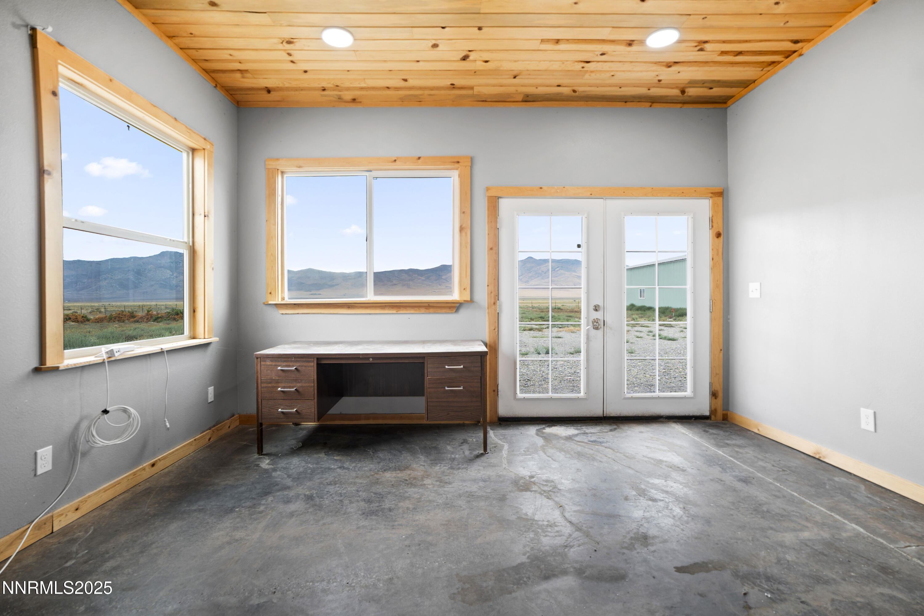 3900 Van Diest Road Winnemucca, NV 89445 - Photo 17 of 45 a view of livingroom with furniture and windows