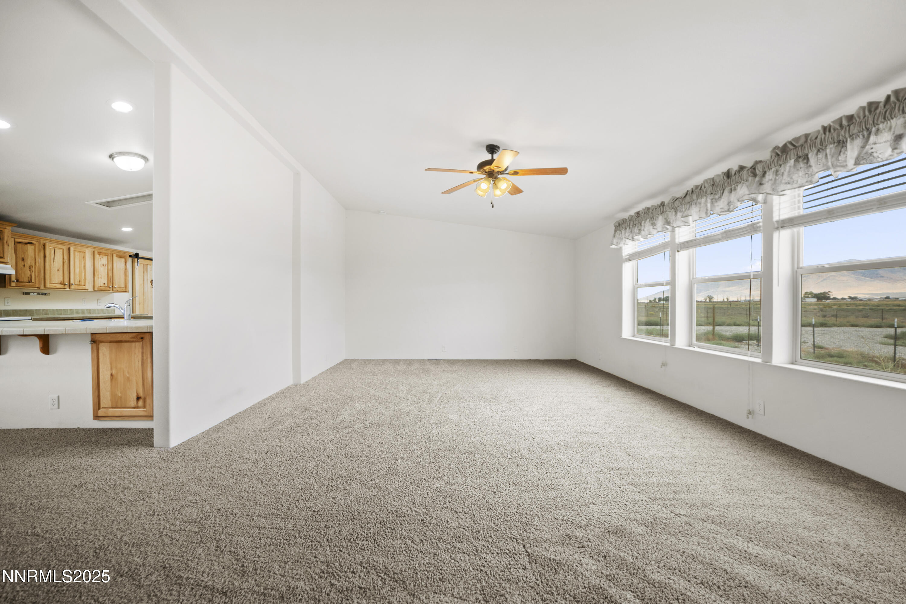 3900 Van Diest Road Winnemucca, NV 89445 - Photo 3 of 45 a view of an empty room with a window