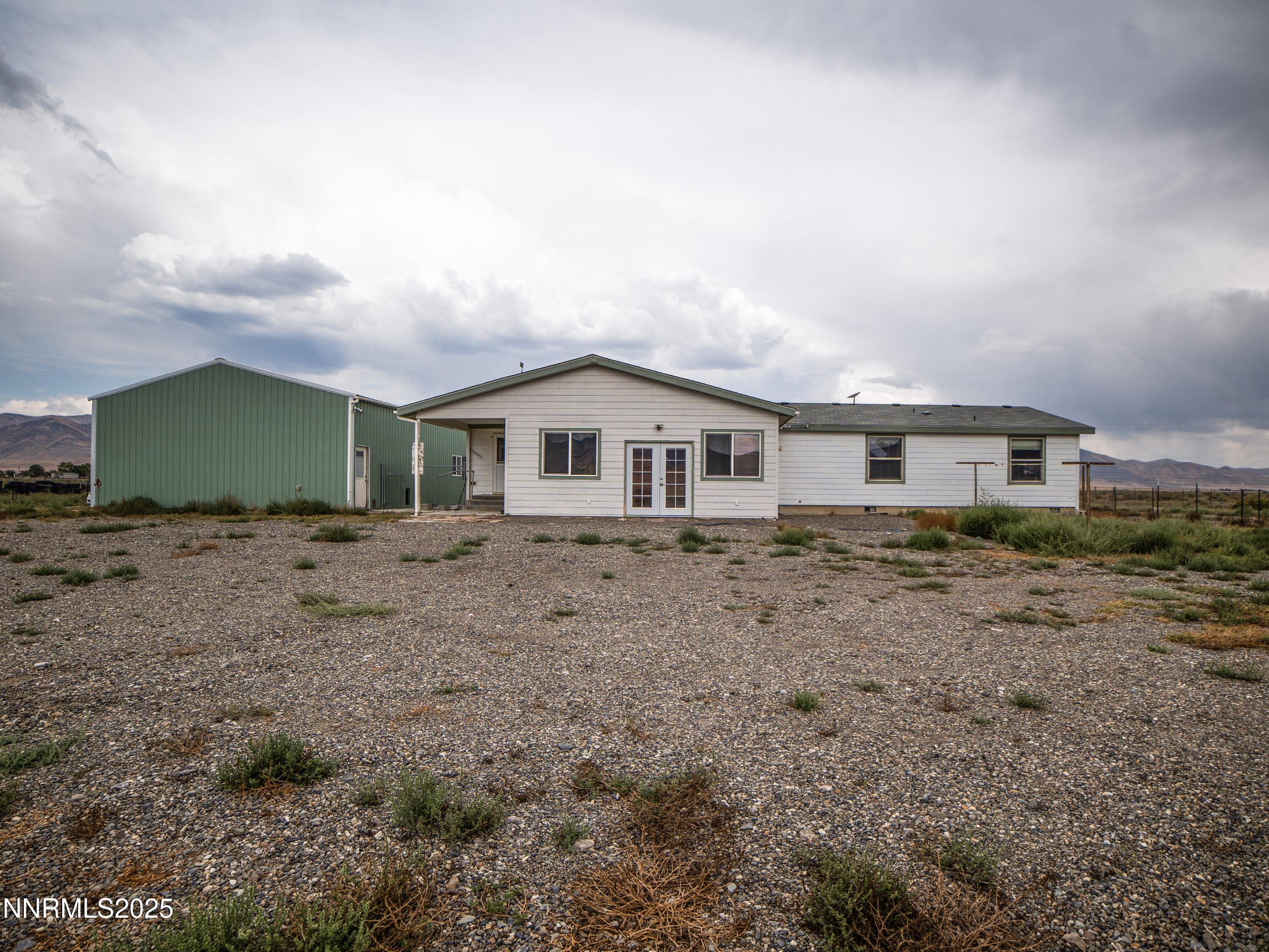 3900 Van Diest Road Winnemucca, NV 89445 - Photo 39 of 45 a aerial view of a house with a yard