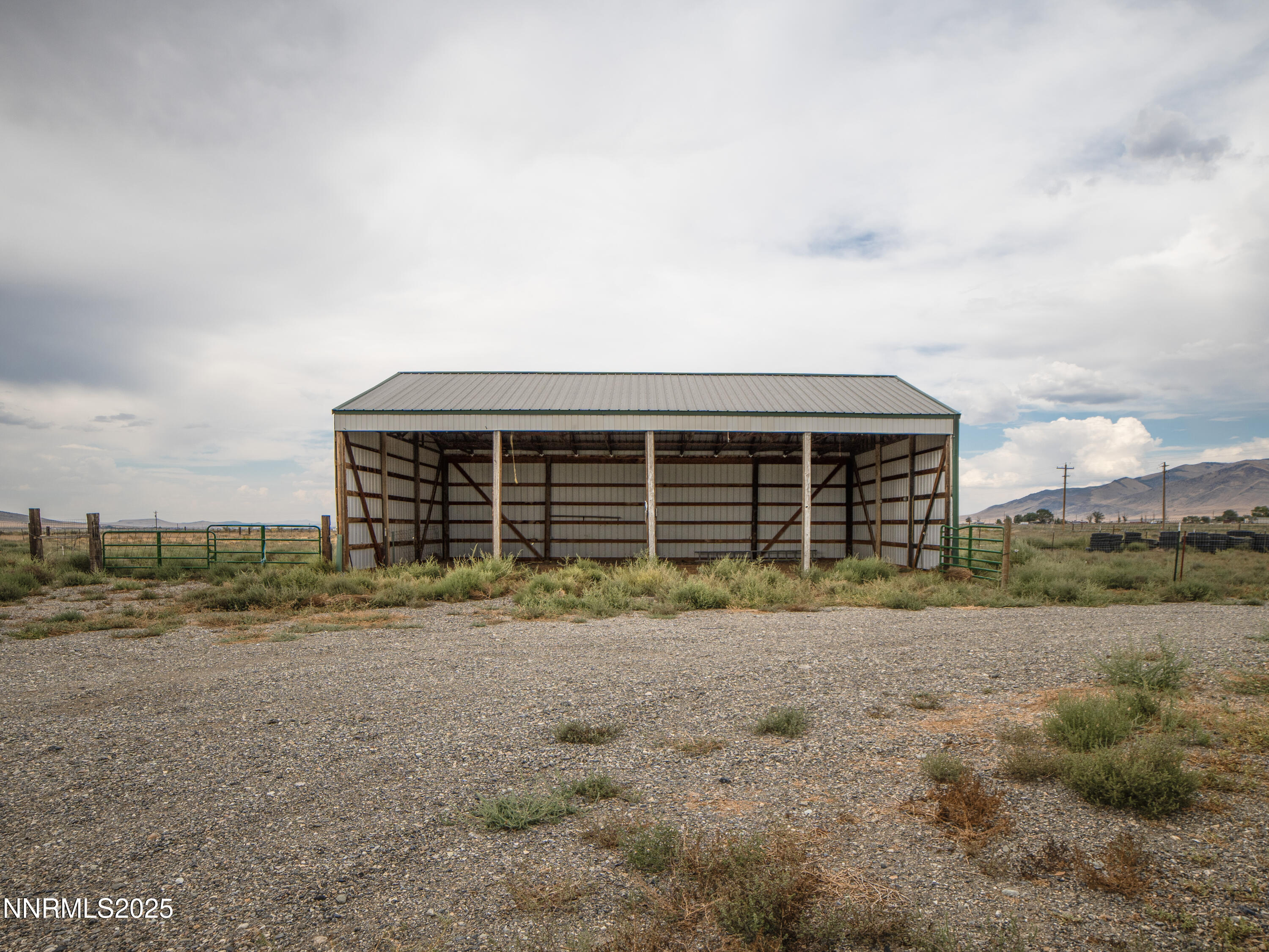3900 Van Diest Road Winnemucca, NV 89445 - Photo 41 of 45 a view of a house with backyard and trees