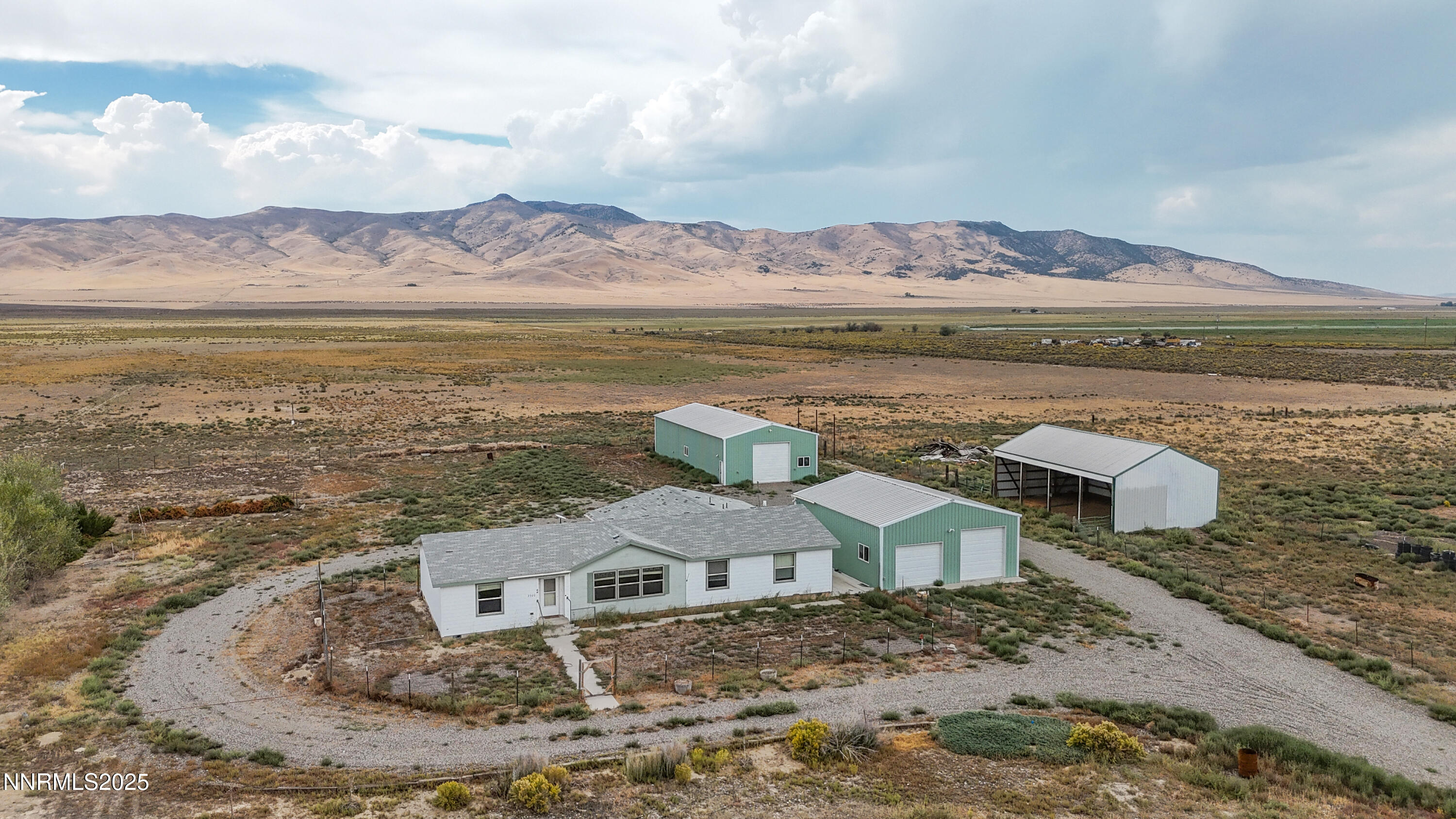 3900 Van Diest Road Winnemucca, NV 89445 - Photo 45 of 45 a view of a lake with a mountain