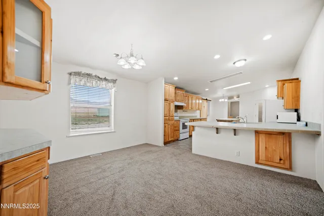 a view of a kitchen with a sink cabinets and a kitchen