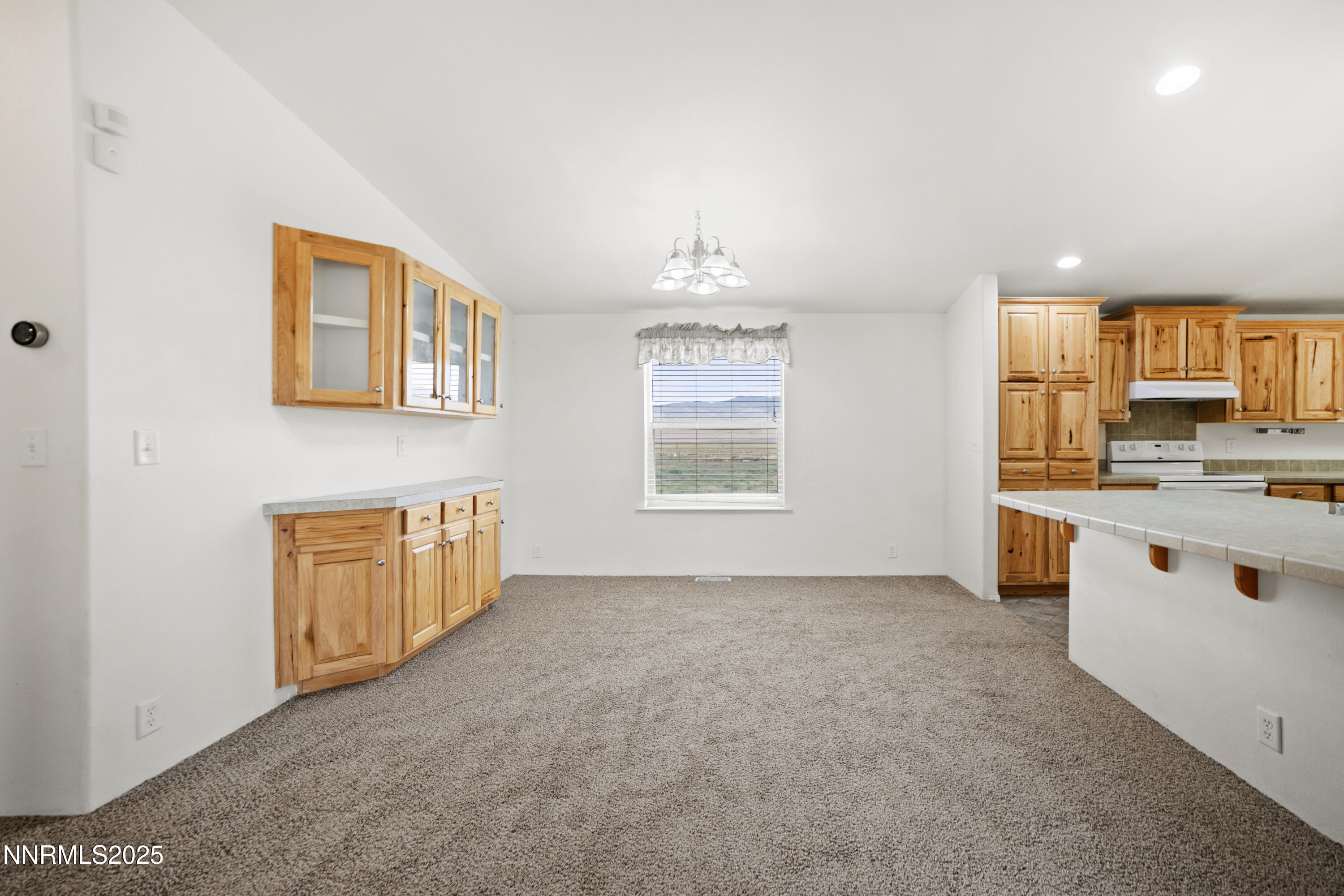 3900 Van Diest Road Winnemucca, NV 89445 - Photo 8 of 45 a view of kitchen with windows and cabinet