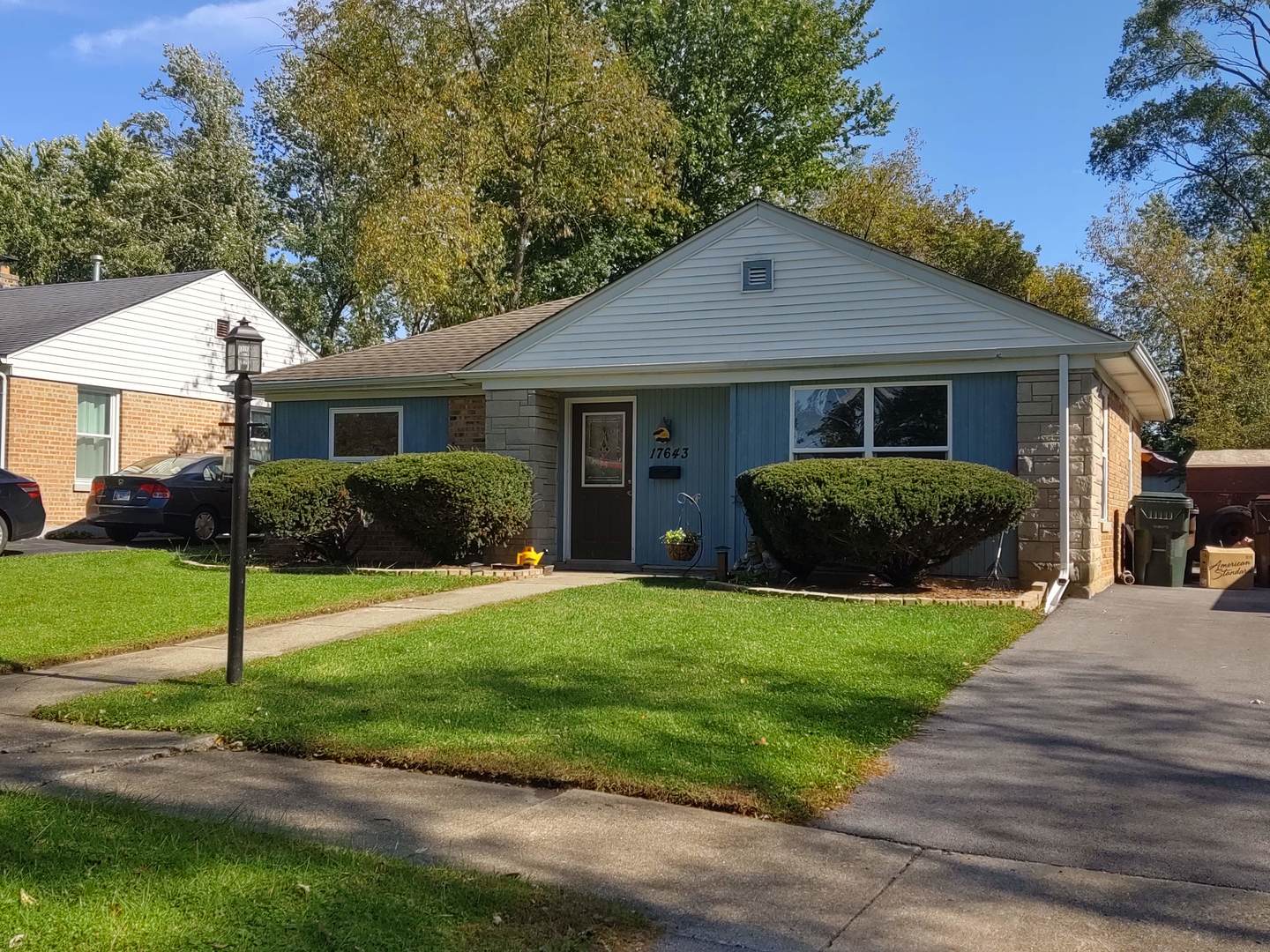 17643 Dundee Avenue Homewood, IL 60430 - Photo 1 of 27 a view of a house with a yard and plants space