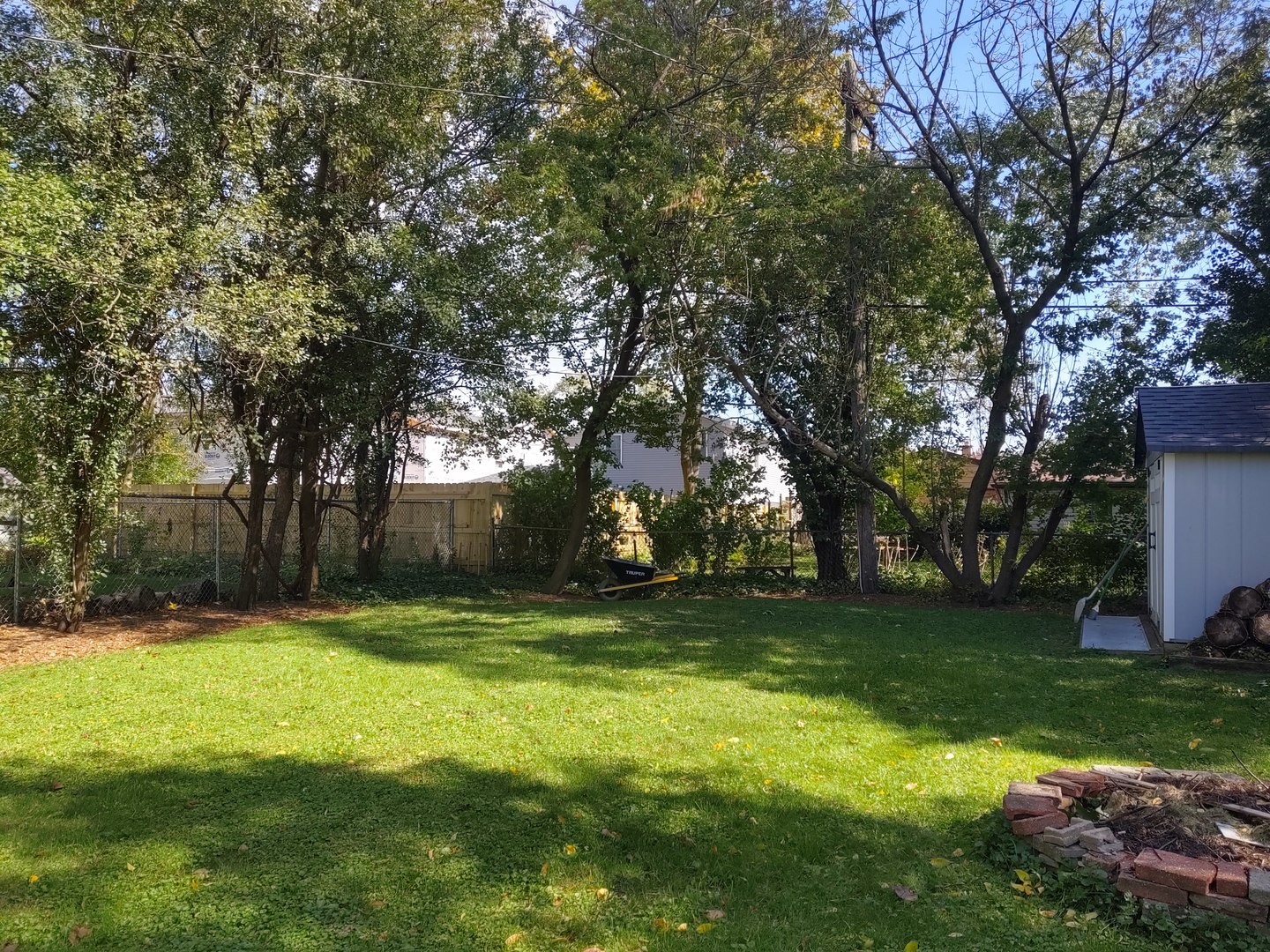 17643 Dundee Avenue Homewood, IL 60430 - Photo 21 of 27 a view of a trees in a park
