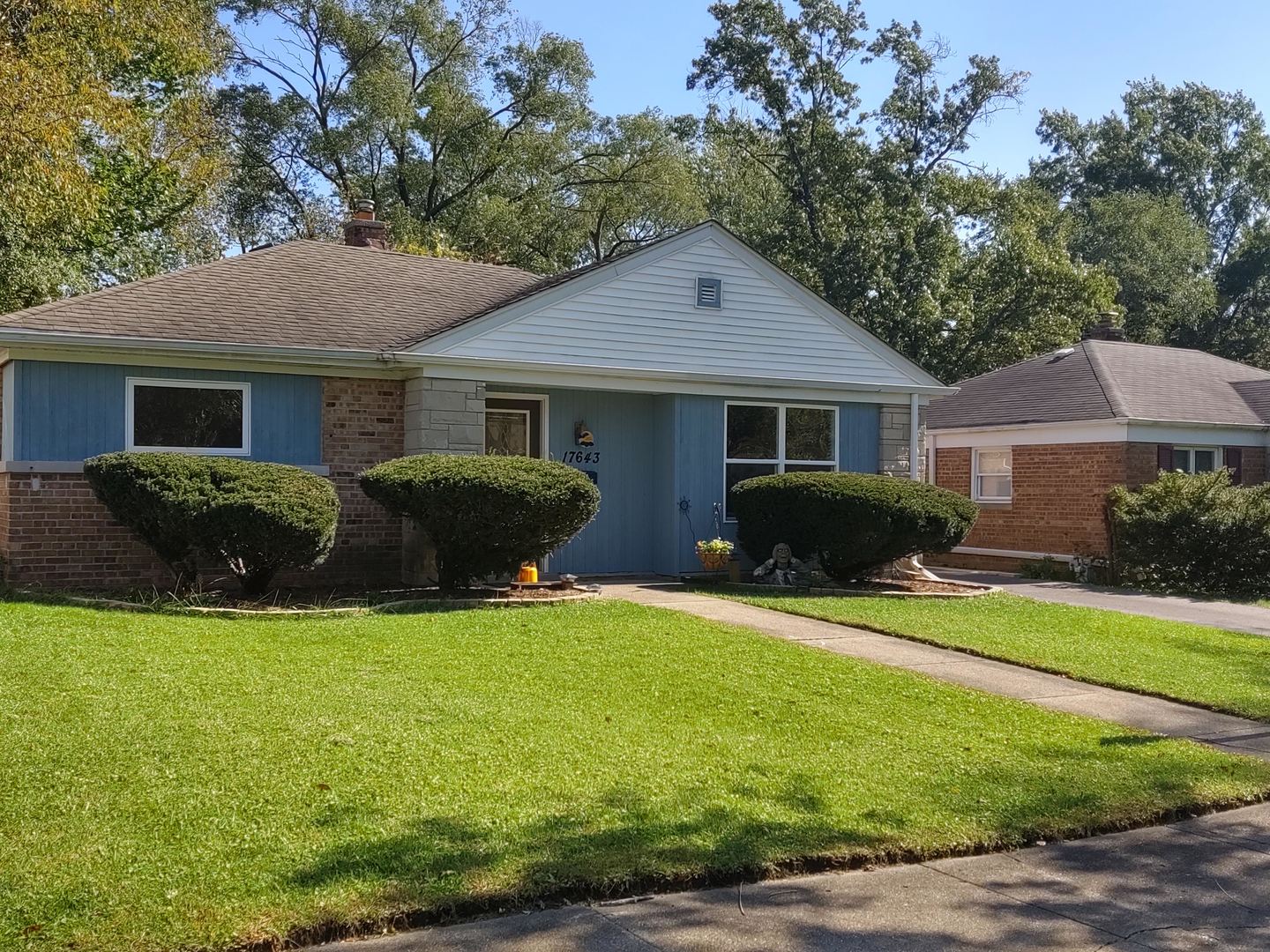 17643 Dundee Avenue Homewood, IL 60430 - Photo 27 of 27 a front view of house with yard and green space