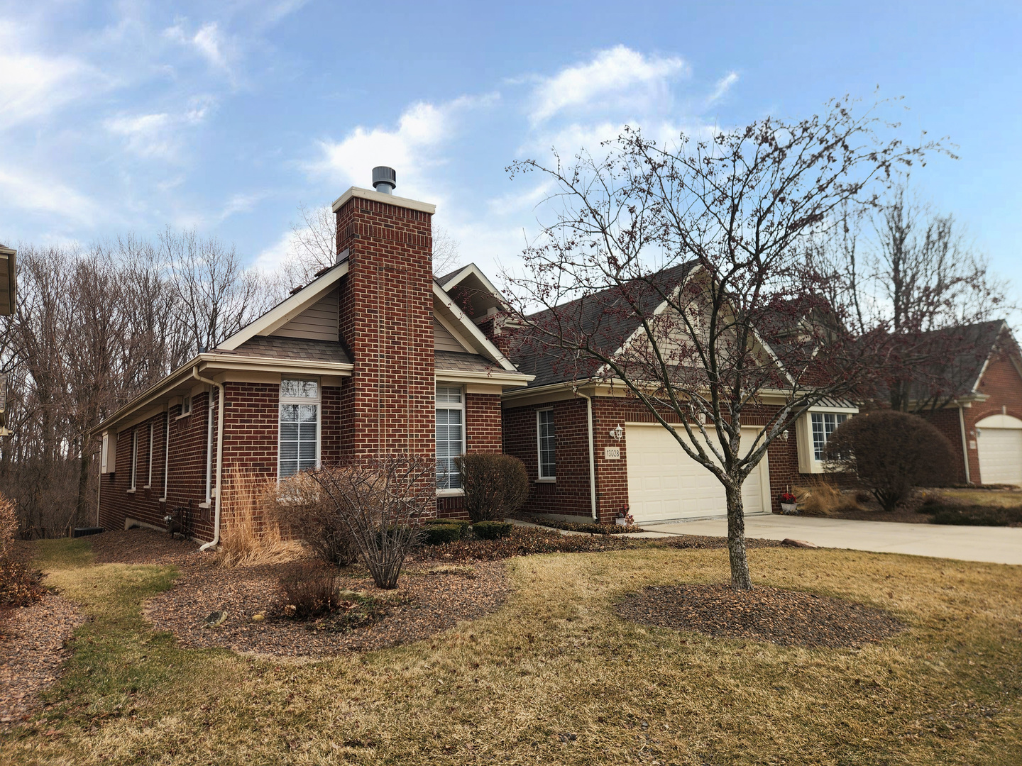 13028 Timber Trail Palos Heights, IL 60463 - Photo 3 of 6 a front view of house with yard and trees around