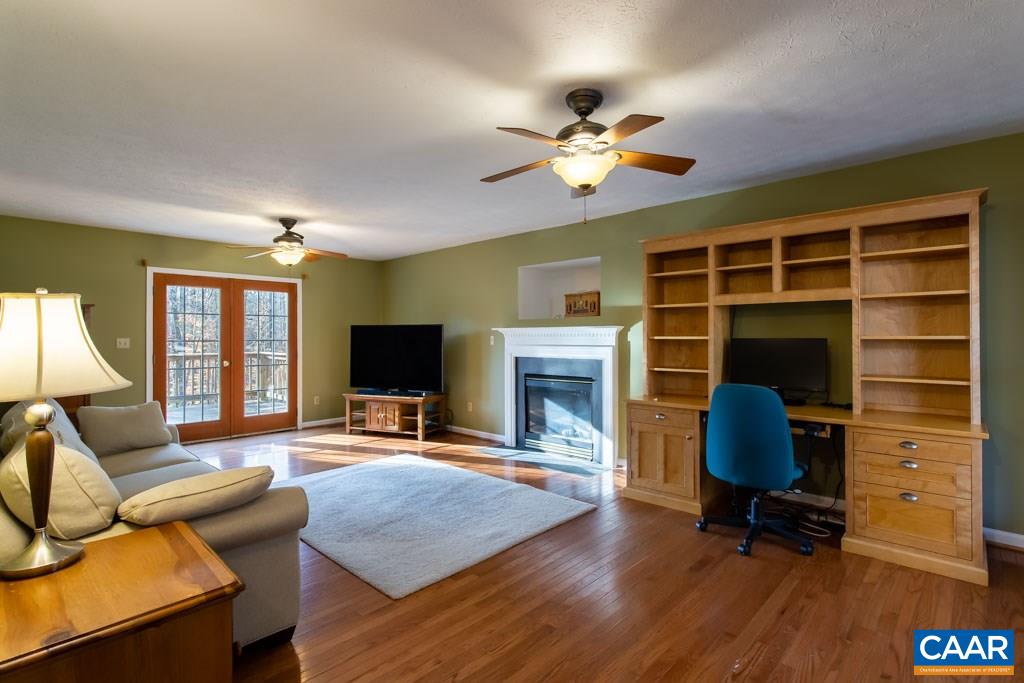 3 Haversack Road Palmyra, VA 22963 - Photo 3 of 48 a living room with furniture and a fireplace