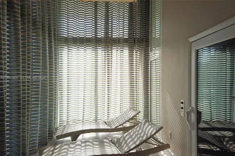 a view of a room with a window