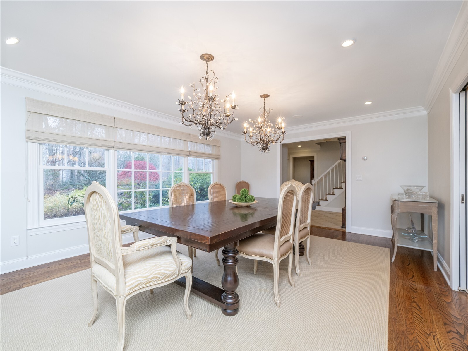 30 Wild Duck Road Wilton, CT 06897 - Photo 11 of 40 a dining room with furniture a chandelier and wooden floor