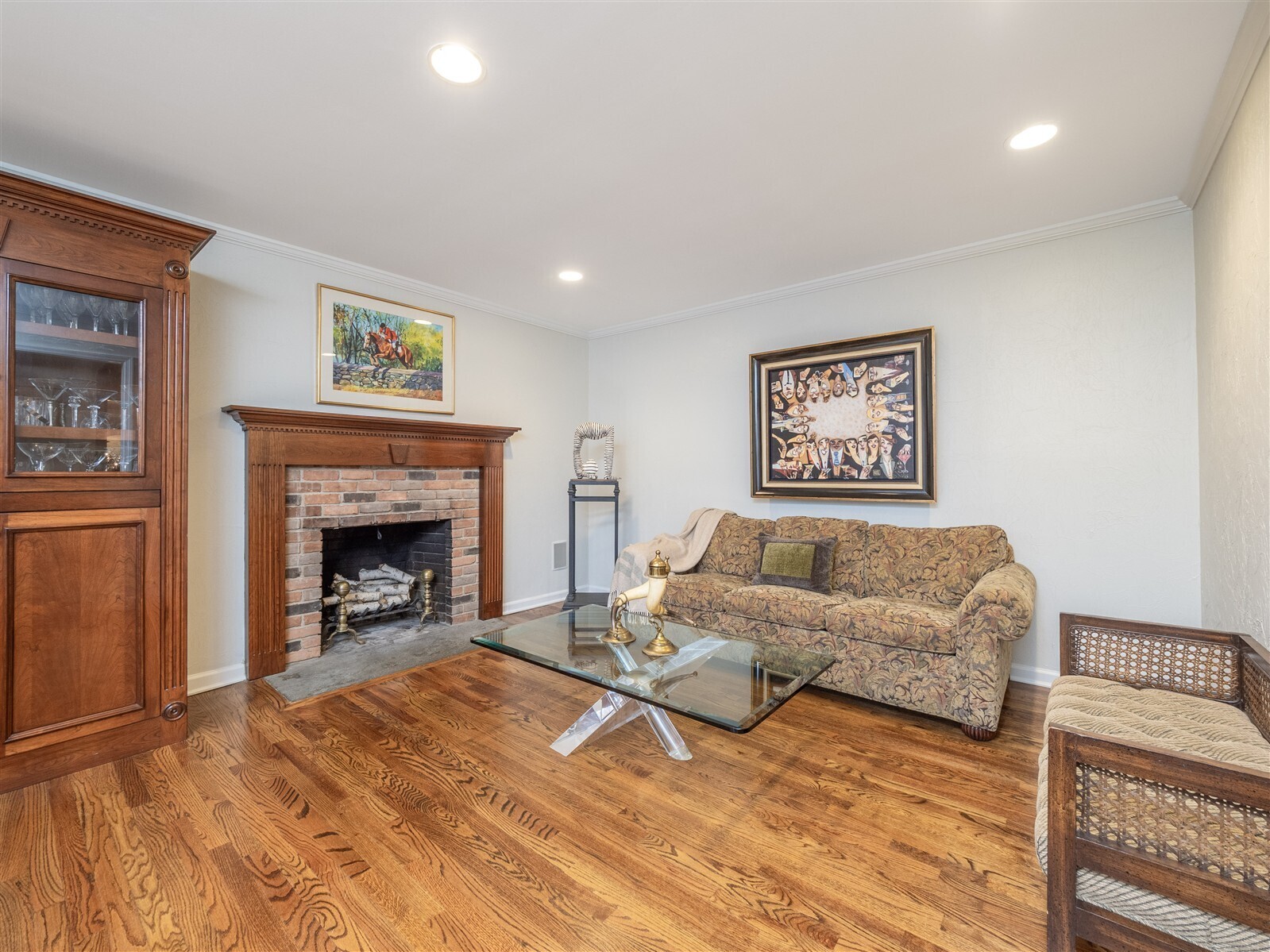 30 Wild Duck Road Wilton, CT 06897 - Photo 13 of 40 a living room with furniture and a fireplace