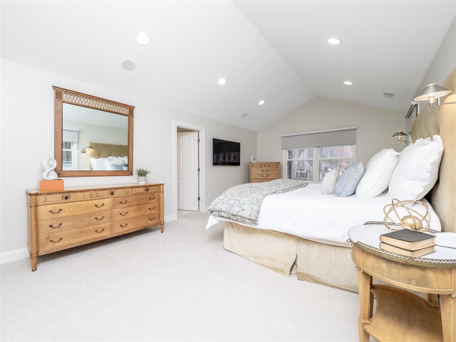 30 Wild Duck Road Wilton, CT 06897 - Photo 18 of 40 a bedroom with a bed and a dresser