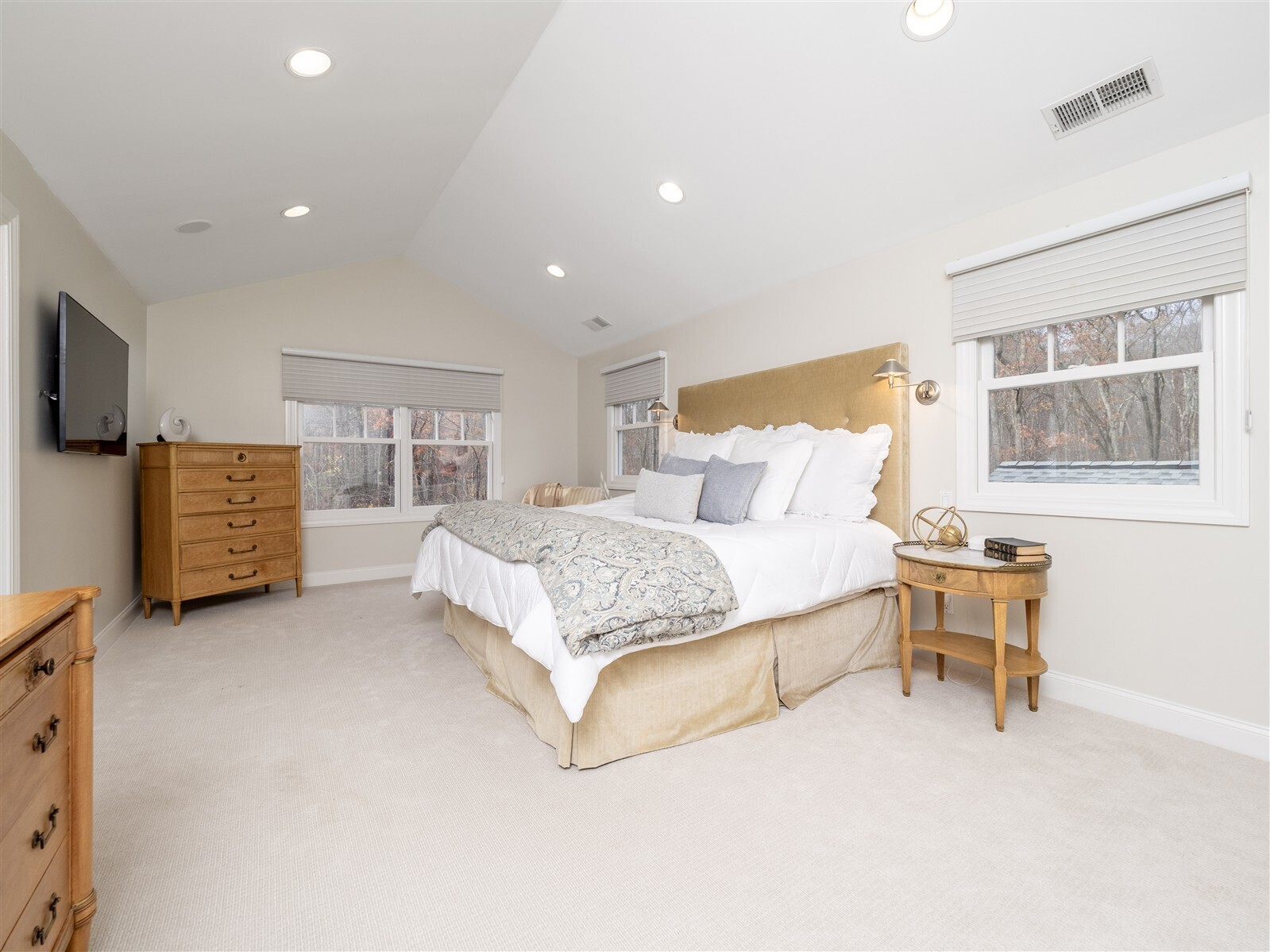 30 Wild Duck Road Wilton, CT 06897 - Photo 19 of 40 a bedroom with a bed and a chair in it