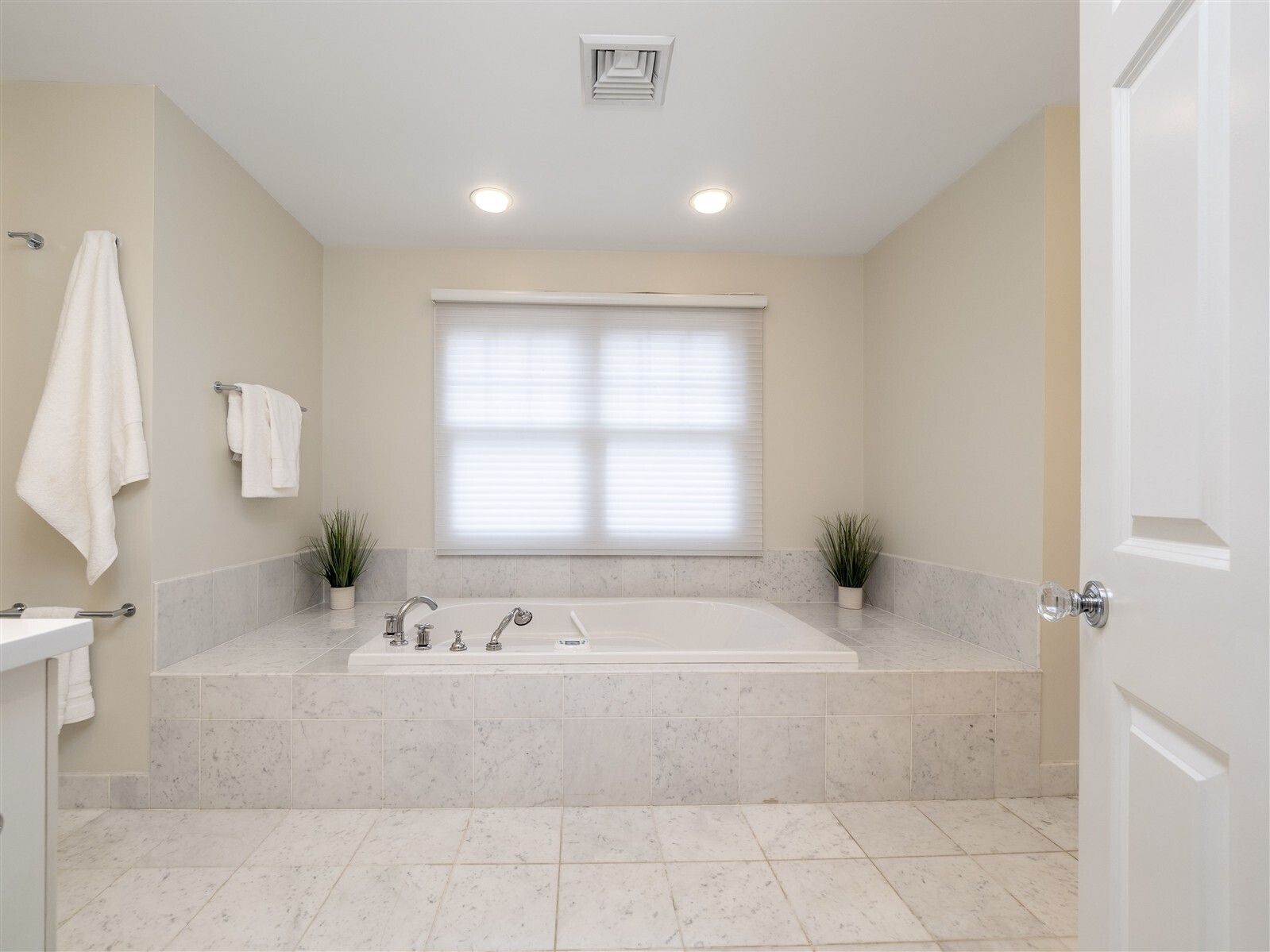 30 Wild Duck Road Wilton, CT 06897 - Photo 20 of 40 a bathroom with a bathtub and a sink