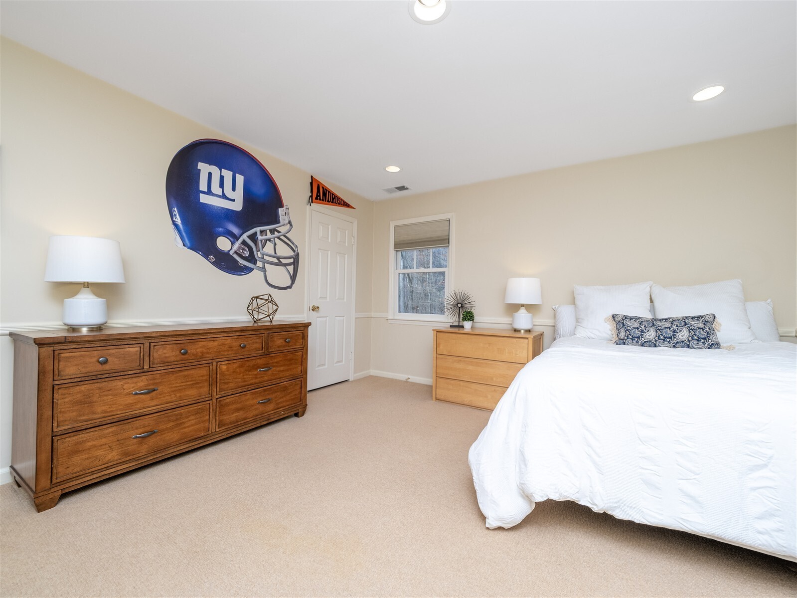 30 Wild Duck Road Wilton, CT 06897 - Photo 25 of 40 a bedroom with a bed and a dresser