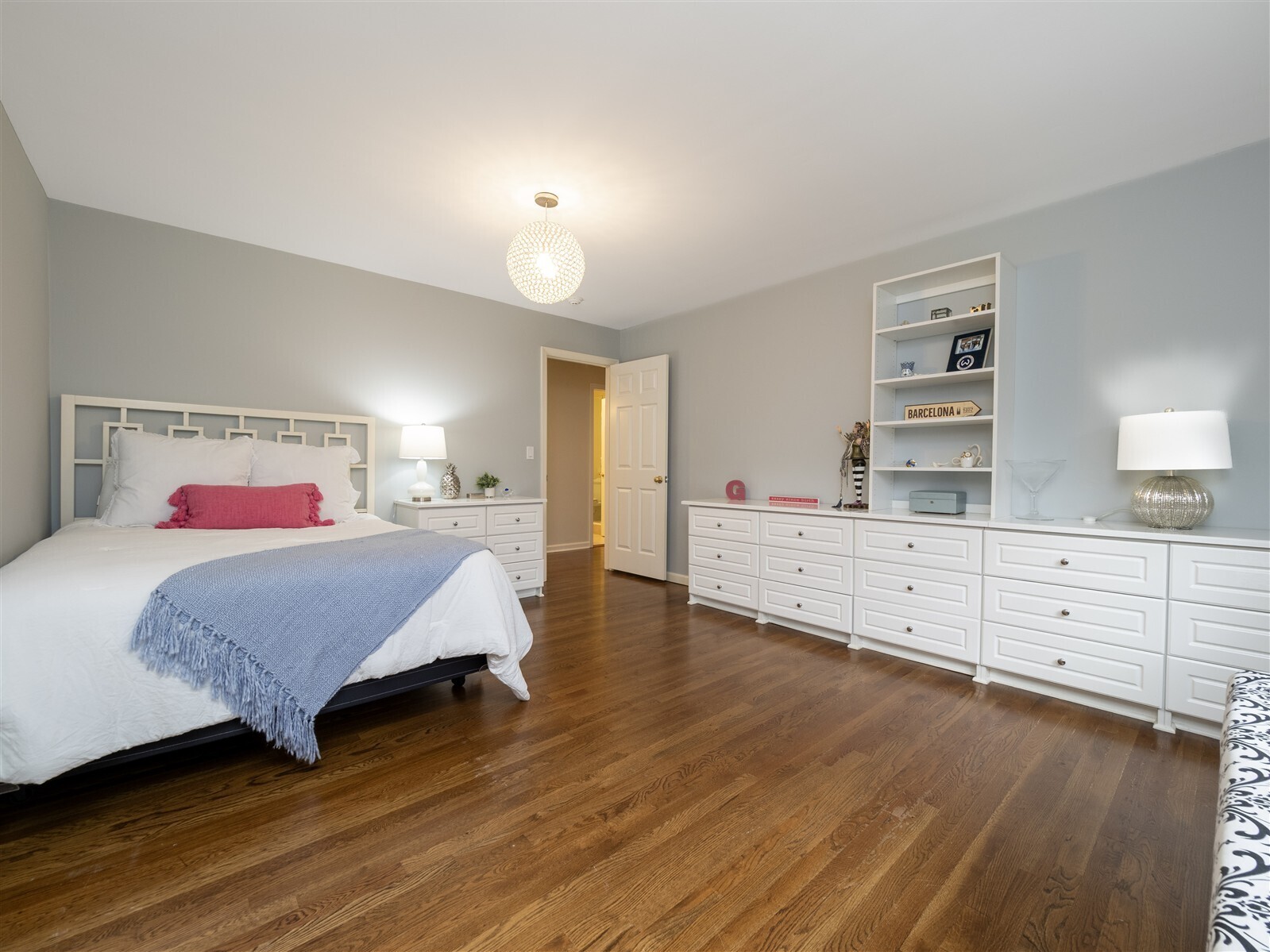 30 Wild Duck Road Wilton, CT 06897 - Photo 27 of 40 a bedroom with a bed and a dresser