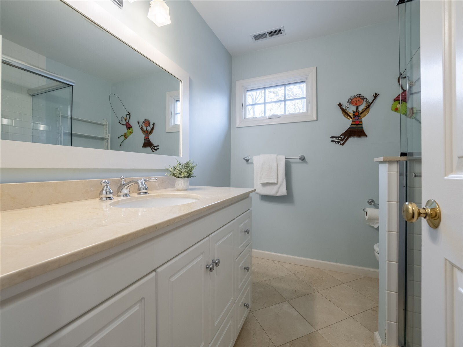 30 Wild Duck Road Wilton, CT 06897 - Photo 28 of 40 a bathroom with a sink and mirror