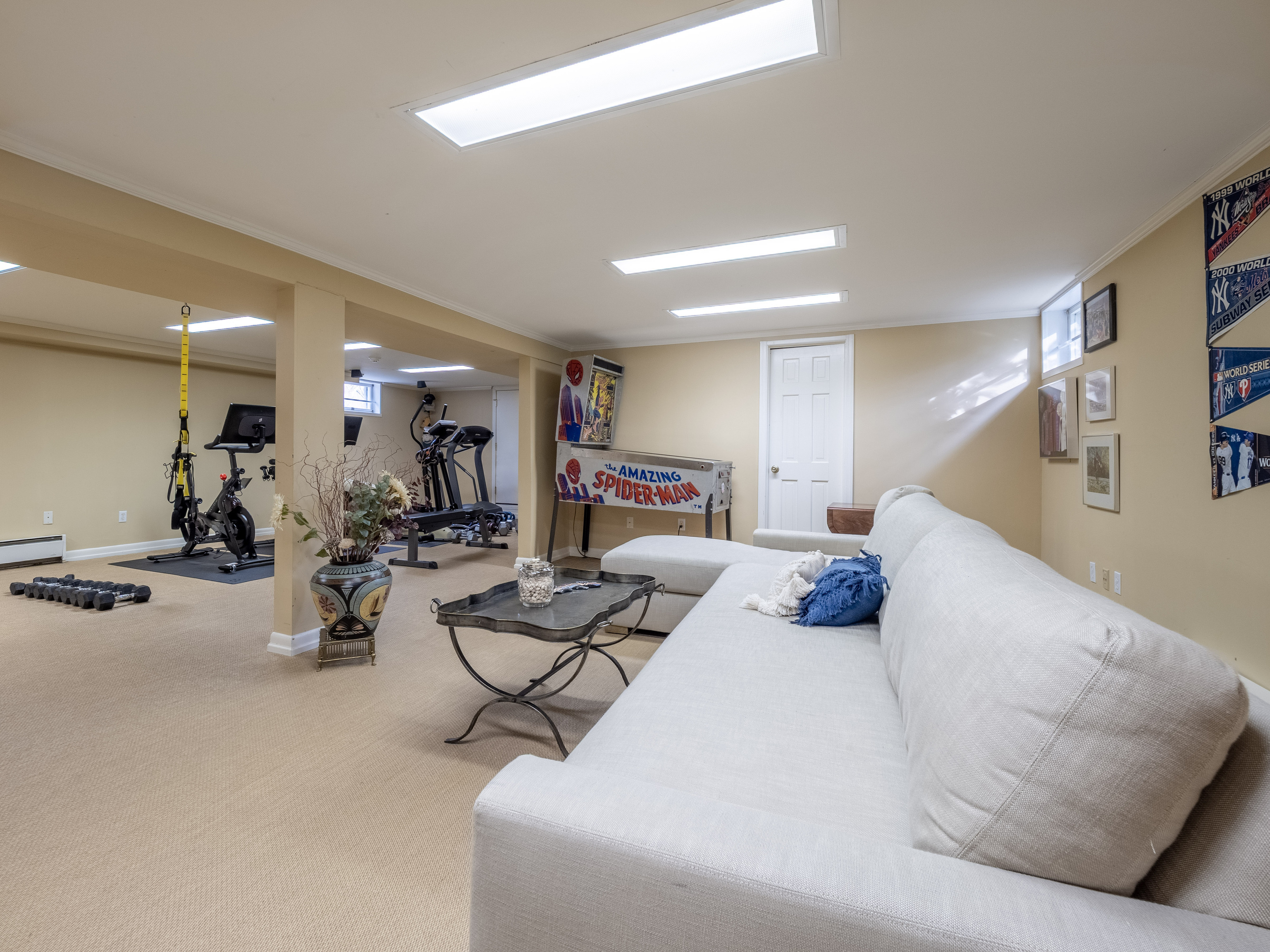 30 Wild Duck Road Wilton, CT 06897 - Photo 31 of 40 a living room with furniture and a flat screen tv