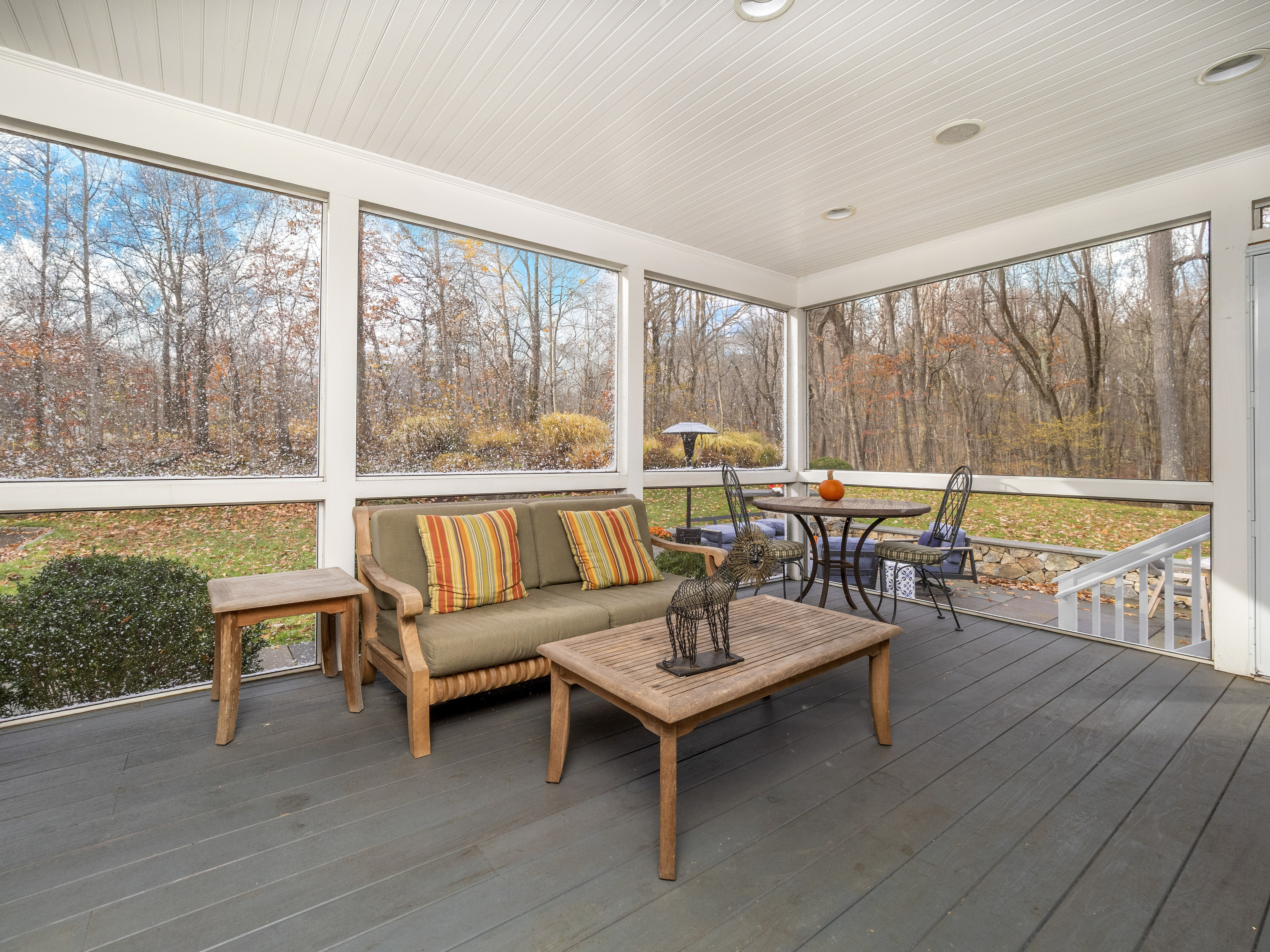 30 Wild Duck Road Wilton, CT 06897 - Photo 34 of 40 a living room with furniture and a floor to ceiling window